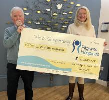 Jim Nicholson from The Rotary Club of Thanet presents a cheque for £1,000 to Karen Pilgrims from the Pilgrims Hospice